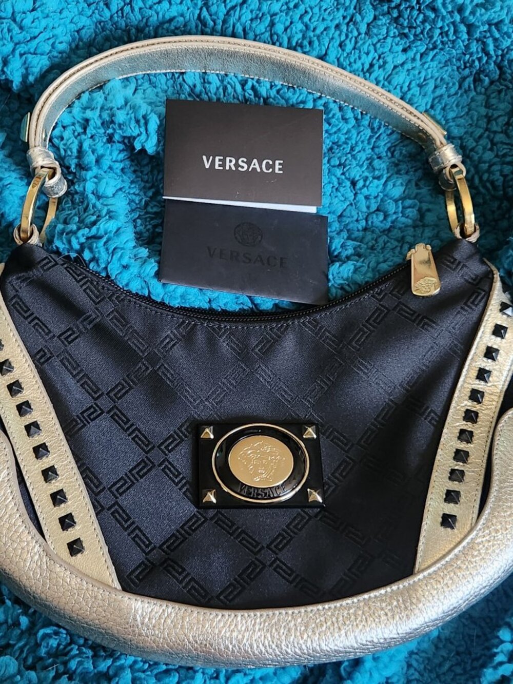 BLACK AND GOLD AUTHENTIC EARLY-2000S VINTAGE VERSACE STUDDED HOBO BAG